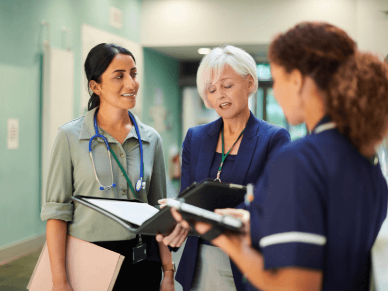 MDT reviewing notes in hospital